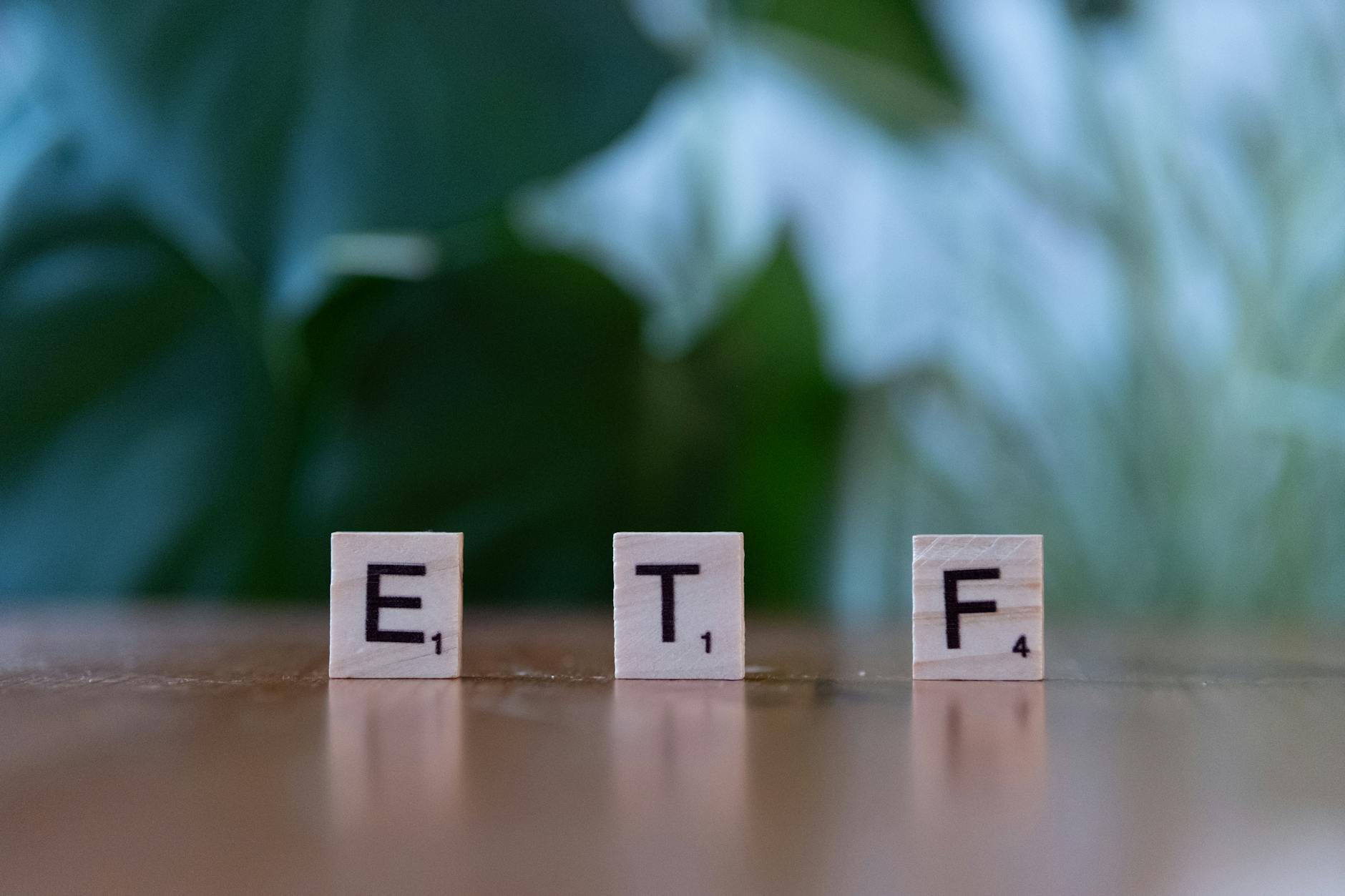 https://www.pexels.com/photo/scrabble-tiles-spelling-etf-on-wooden-table-30917896/