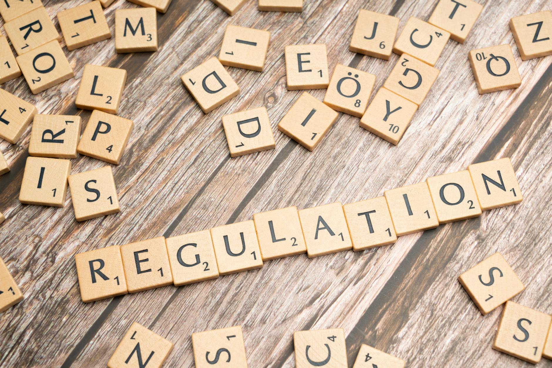 https://www.pexels.com/photo/scrabble-letters-spelling-the-word-regulation-19813733/