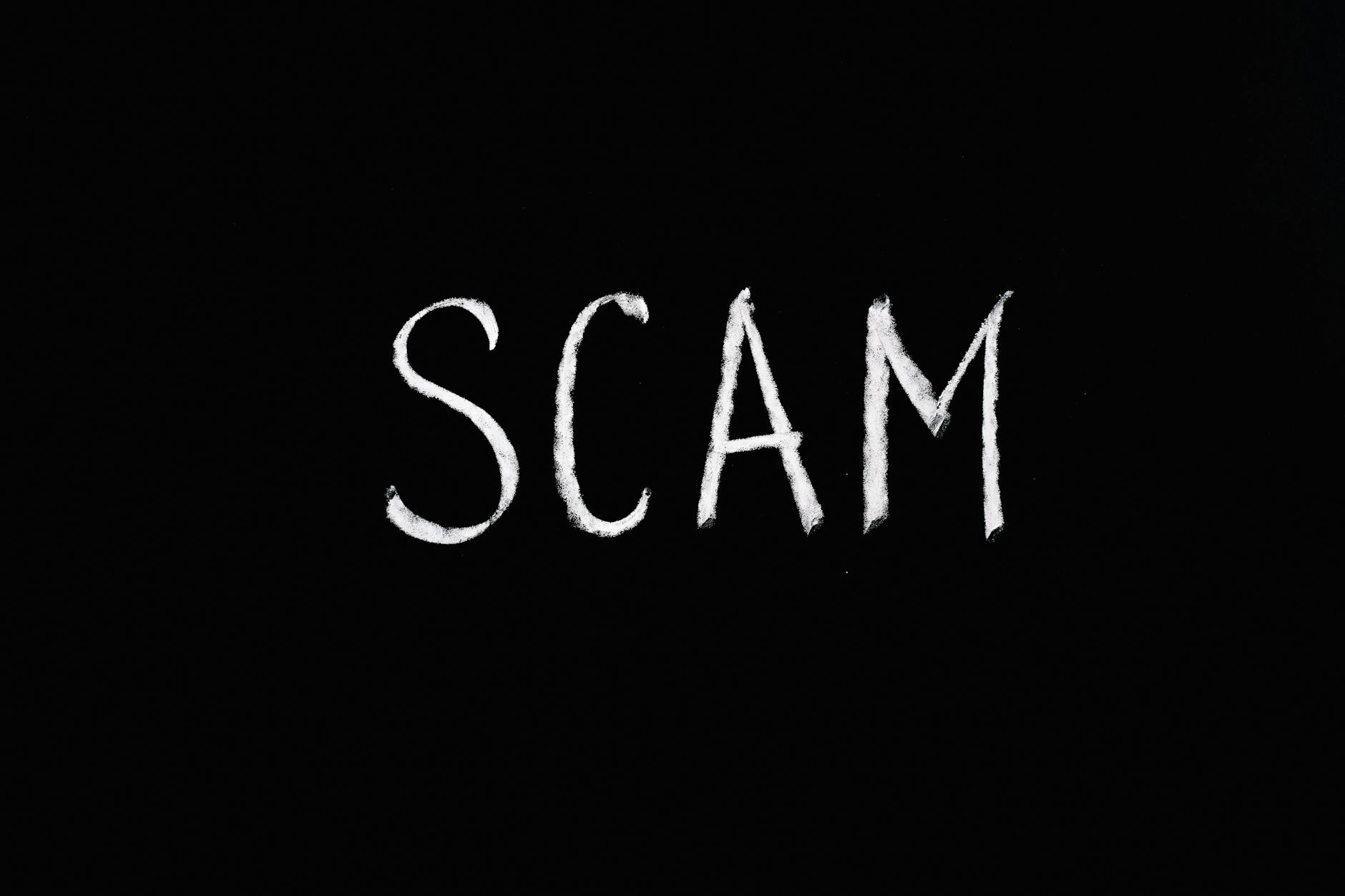https://www.pexels.com/photo/scam-lettering-text-on-black-background-5697260/