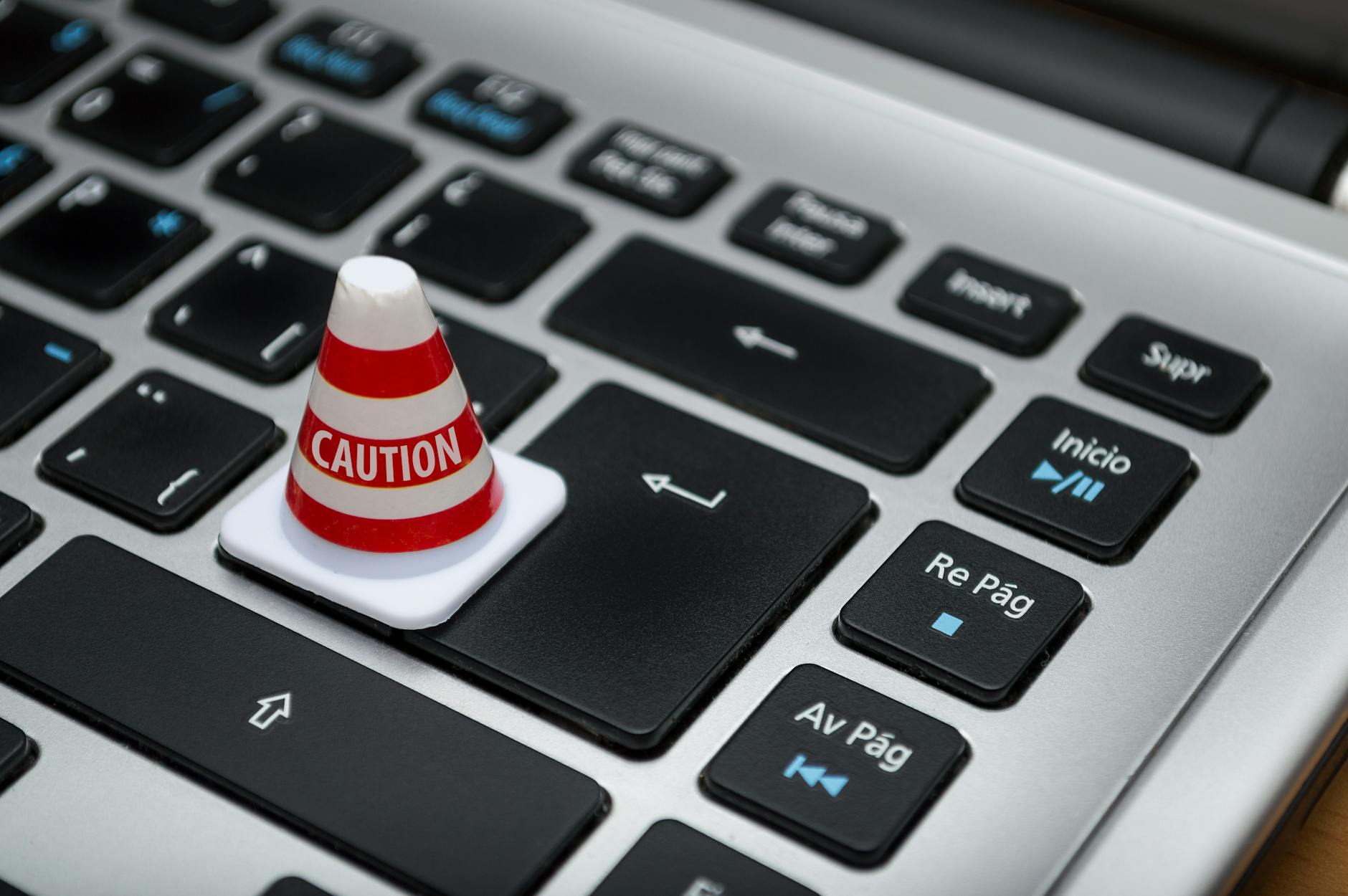 https://www.pexels.com/photo/white-caution-cone-on-keyboard-211151/